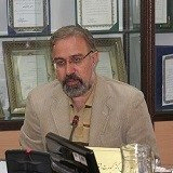 دکتر کیومرث اشتریان دانشیار دانشکده حقوق و علوم سیاسی دانشگاه تهران